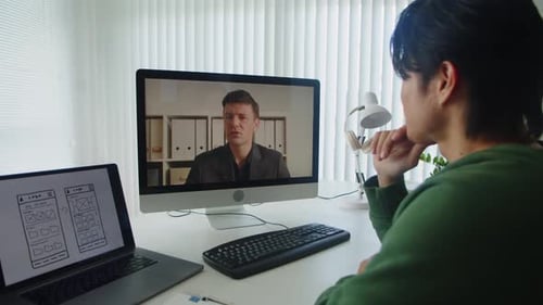Person has a video call on computer