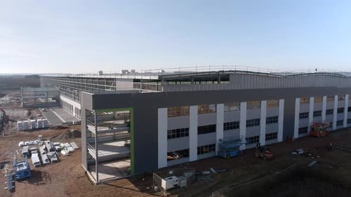 Large Warehouse Construction Project Building Site Aerial View
