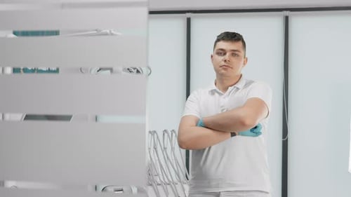 Confident Dental Professional Providing Care in a Modern Clinic Ensuring Patients Health and Hygiene