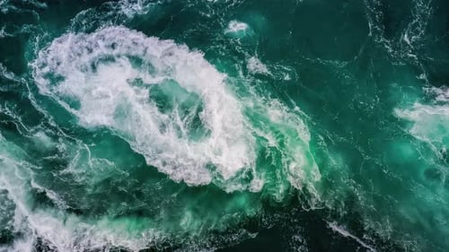 Waves of water of the river and the sea meet each other during high tide and low tide.