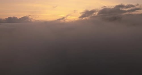 Sea Of Clouds Amidst The Hues Of Sunset