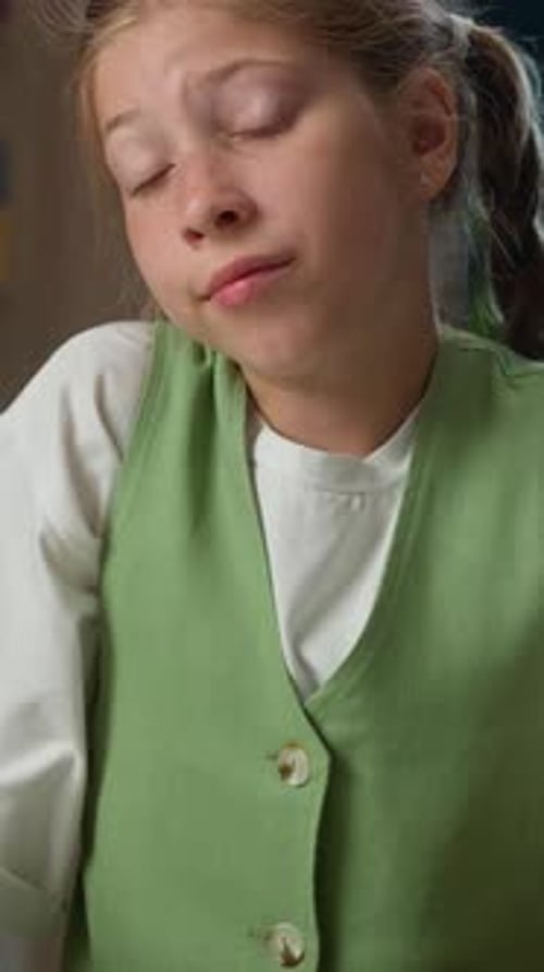Frustrated Caucasian Girl Little Girl Child Kid Doubtful Pupil Looking at Camera Shrugging Shoulders