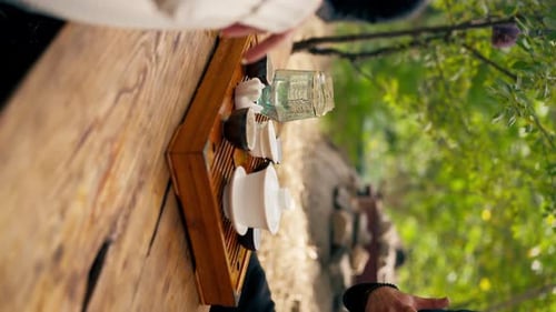 Vertical Footage of Traditional Tea Ceremony in Nature
