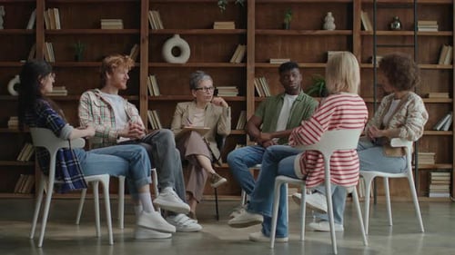 People in Group Discussion Sitting in Circle