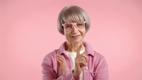 Fashionable Elderly Lady in Pink Exuding Confidence and Charm Camera 8K