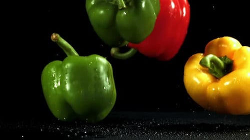 Sweet Pepper Falls on a Wet Board Filmed on a Highspeed Camera at 1000 Fps