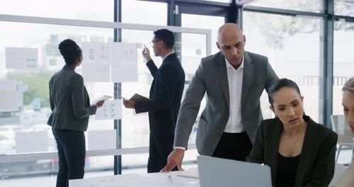 4k video footage of a group of businesspeople working in an office