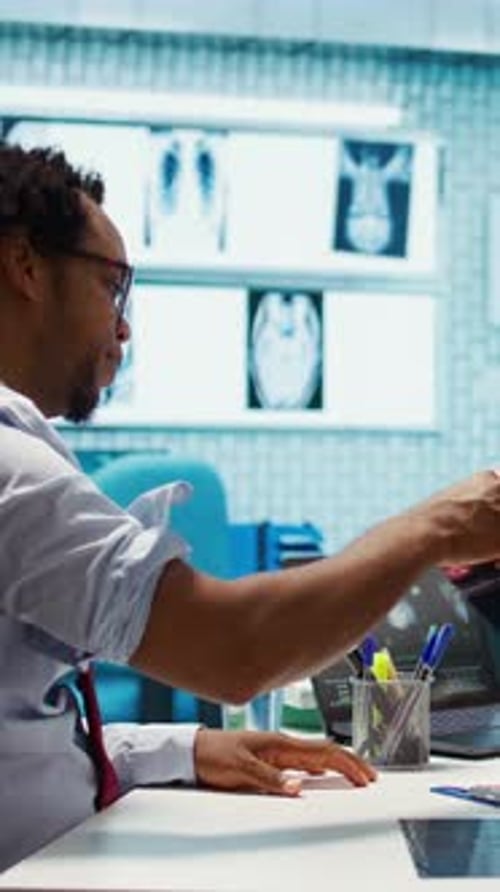 Man Getting Blood Pressure Check in Medical Office