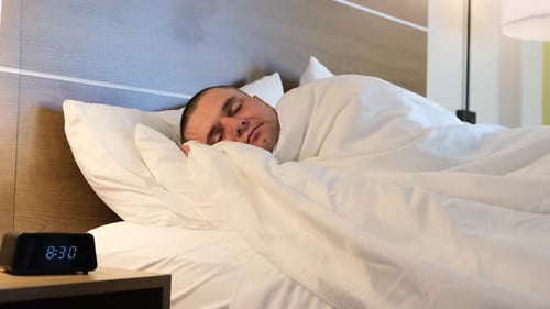 Sleepy Man Waking Up in the Morning