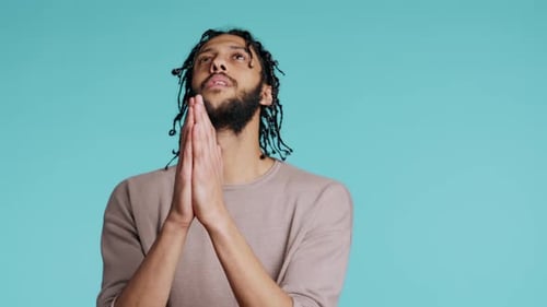 Pious Man Praying to His God Asking for Forgiveness Feeling Desperate Studio