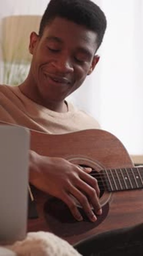 Vertical Video Online Music School Guitar Man Home