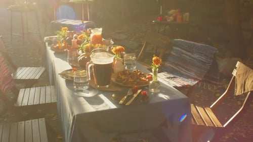 Festively Set Dining Table in Autumn Backyard