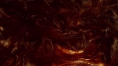 Defocused YellowOrange Sparkling Fluid and Glitter Paint Merge Into Abstract Artistry