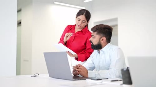 Indian Business Professionals Collaborating in Office