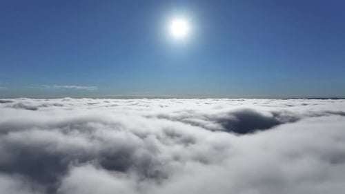 Aerial View of White Clouds Against Blue Sky