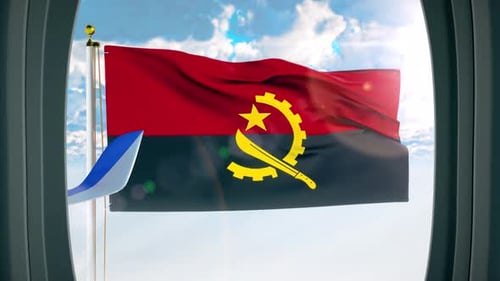 Airplane Window View with Waving Angola Flag