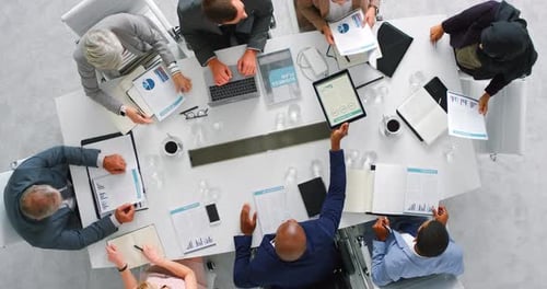 Business meeting, teamwork and planning with technology in office with business people working