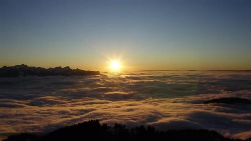 Bright Sun At Sunset Shining Over Sea Of Clouds And Le Folly Summit In Prealps, Vaud, Switzerland. -