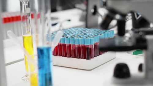 Test Tubes and Microscope in a Laboratory