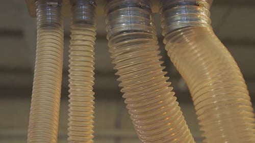 Close up of flexible duct for industrial extractor working. Close up