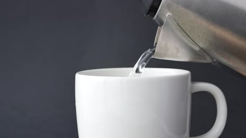 Hot Water in a Jar on Table
