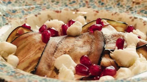 Grilled Eggplants Turkish Salad with Feta Cheese and Tomatoes on a Plate Cooking Traditional Middle