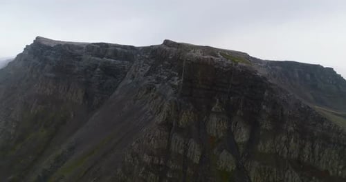 cliff of mountain in fjords aerial view