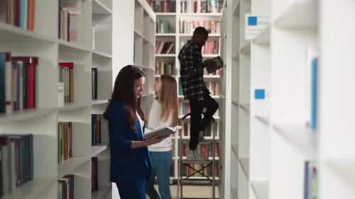 Students Choose Books in Public Library