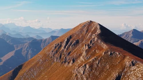 Breathtaking Aerial View of Majestic Italian Alps Mountain Peak in Tranquil Setting
