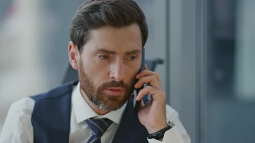Smart Busy Director Discussing Work by Phone Sitting Office Close Up. Portrait