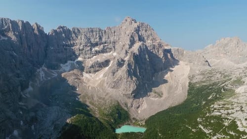 Drone shot of Lake Sorapis in Dolomites, Italy on a sunny day