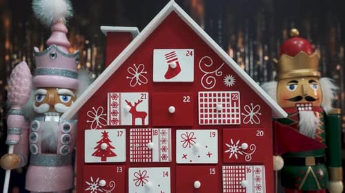 Wooden Tree Advent Calendar Decorated and Nutcracker Soldier Toys With Bokeh Blured BackgrWooden Tre