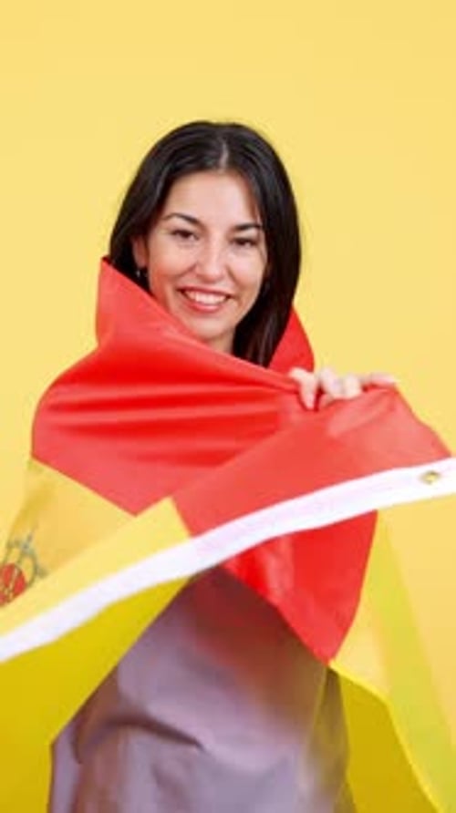 Young Woman Holding the Spanish Flag