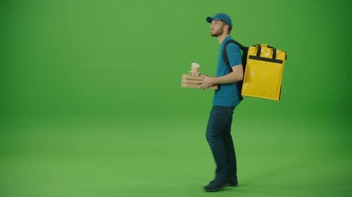 Green Screen Delivery Man in Yellow Uniform With Thermal Backpack Brings Pizza