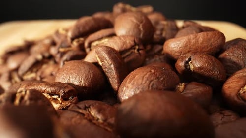 Beautiful coffee beans. Close-up macro video. 4K