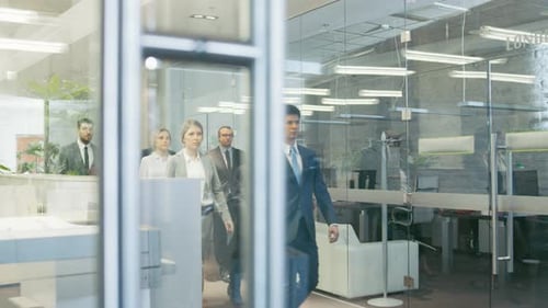 Diverse Team of Delegates/ Lawyers Confidently Marching Through the Corporate Building Hallway. Mul