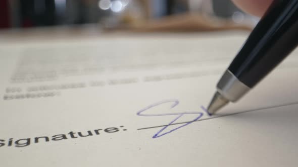 Signature by Pen in Male Hand. Sign Document on Deal at Office ...