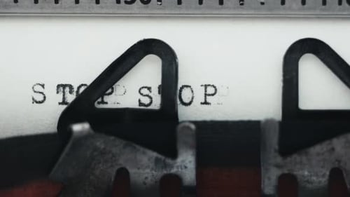 Typing Word Stop on Retro Typewriter