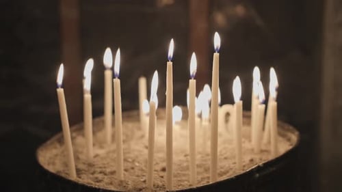 Candles shining and oscillating in Church