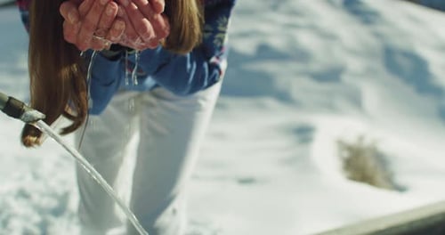 Cinematic Close Up shot of Young Thirsty Female Tourist Drinking Fresh Pure Cold Water fr
