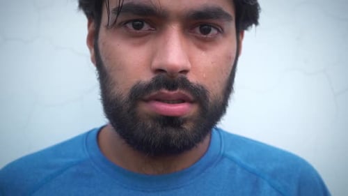 Close Up Shot Of An Indian Man With Tears Falling From His Eyes at Agra, Uttar Pradesh, India