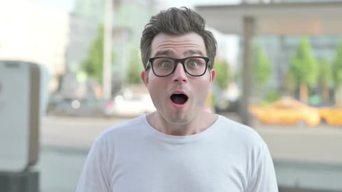 Excited Man Celebrates Success in the City