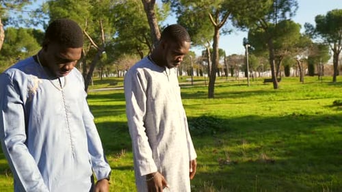 Senegalese Men Praying in Park During Ramadan