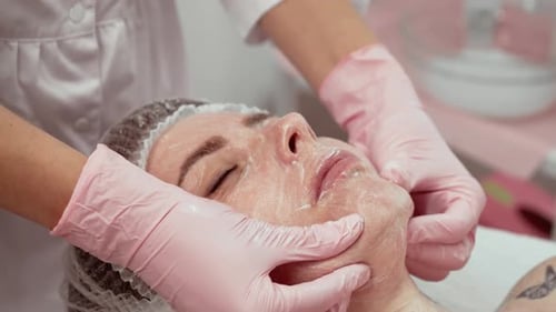Beautician Performing Facial Massage As Part of Beauty Procedures in Cosmetology Clinic Skincare
