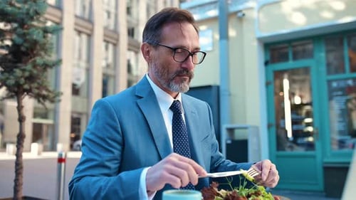Middle aged business man going to work at his office.