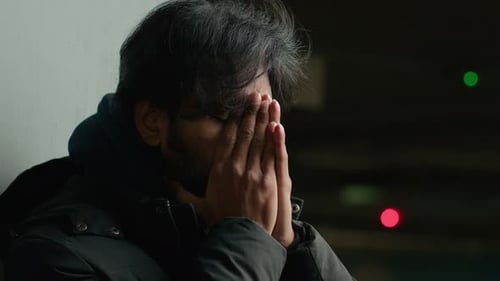 Close Up Homeless Worried Anxiety Sad Stressed Arabian Unhappy Man in Dark City Painful Head