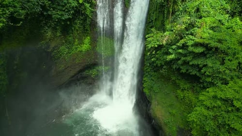 Aerial Drone View of Beautiful Aling Aling Waterfall in Nothern Bali Indonesia