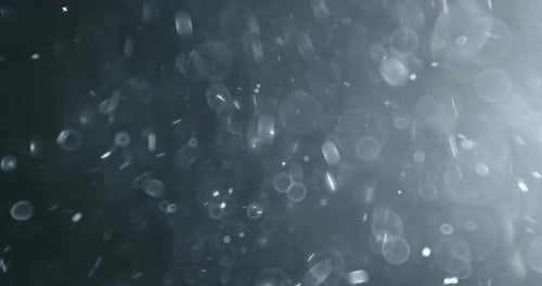 Abstract Particles and Bokeh Light Background