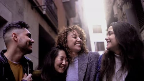 Happy diverse people having fun walking by the city - Multiracial friends lifestyle concept