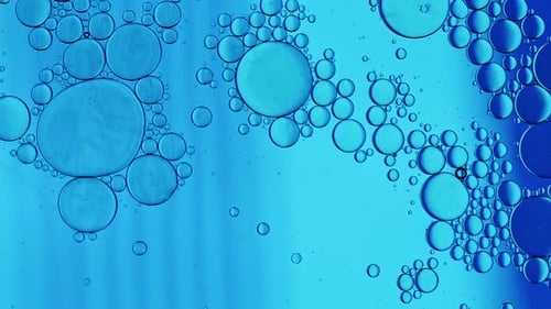 Abstract Blue Oil Droplets in Water